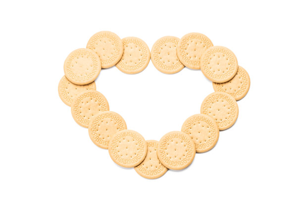 Cookie孤立在白色背景上。圆饼干切出来。甜食的概念。心的象征图片下载