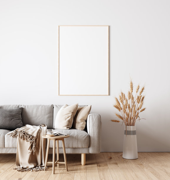 现代室内设计的客厅在自然的颜色与干植物装饰和空白的白色模拟画框图片下载