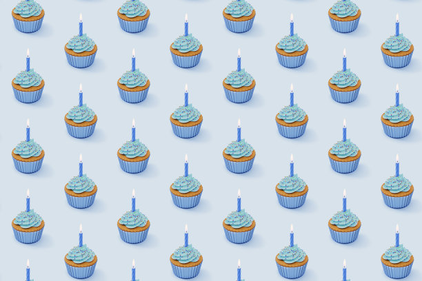 无缝图案与纸杯蛋糕与蓝色釉在蓝色背景，3d渲染。图片下载