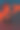 生活方式，一个年轻漂亮的黑发白种人在晚上沐浴在大海与照明红光，蓝色小时，垂直照片图片下载