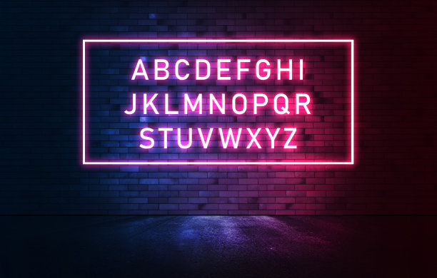 霓虹灯字母照亮砖墙。图片下载