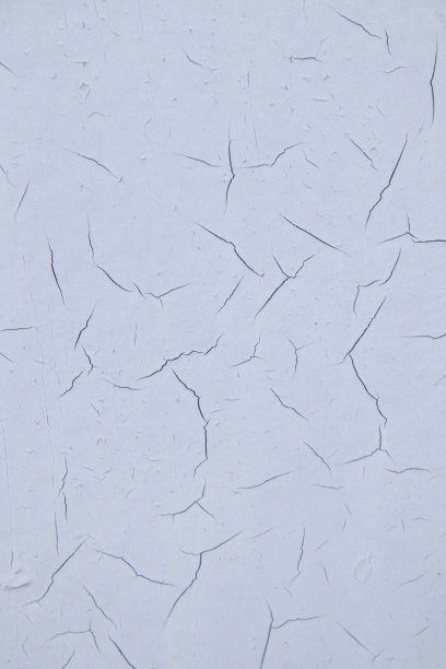 墙上的旧油漆开裂了。质地、图案,背景。墙裂用漆，抽象漆后面的铁。近距离图片下载