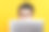 惊奇兴奋的白人年轻男子戴着眼镜从笔记本电脑后窥视，看着惊讶的相机，而站在孤立的橙色背景，特写图片下载