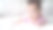 快乐的亚洲婴儿在白色柔软的床上学习爬行。3个月大的婴儿面部表情。可爱的和微笑的宝贝..图片下载