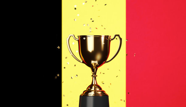 冠军概念-星星形状的五彩纸屑落在一个金杯上坐在比利时国旗上图片下载