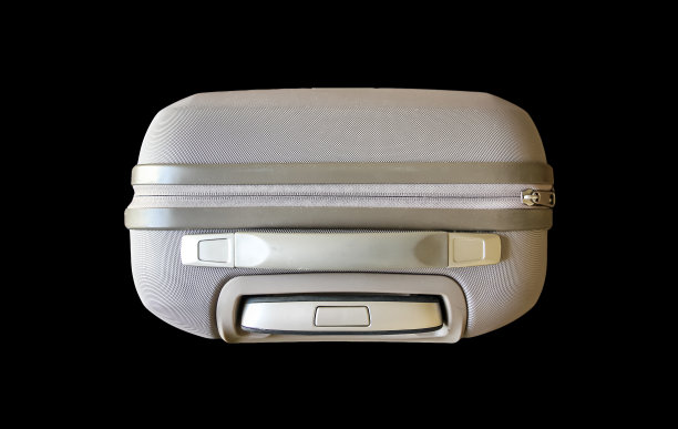 旅行现代手提箱孤立的黑色背景。俯视图图片下载