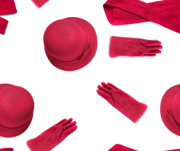 无缝模式与红色女性帽子，围巾和手套隔离在白色背景。设置设计。图片下载