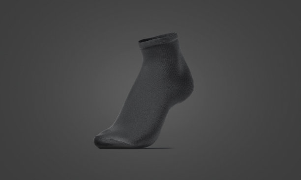 空白的黑色踝袜在脚尖模型，黑暗的背景图片下载