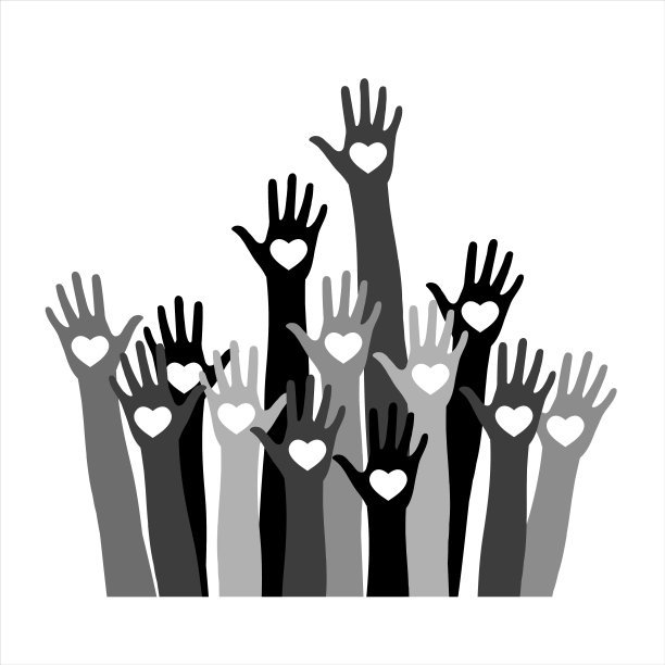 志愿者的概念，不同肤色的手，心在手掌。图片下载