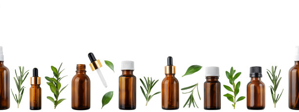 水平无缝平铺背景的滴管和喷雾瓶与油和草药隔离在白色横幅与复制空间。草本化妆品的概念图片下载