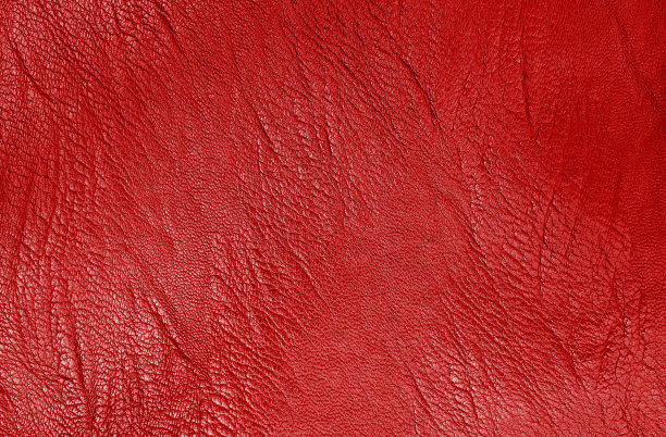 深红色皮革纹理背景与无缝图案。图片下载