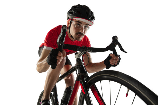 近距离专业男性自行车骑公路自行车孤立在白色背景。图片下载