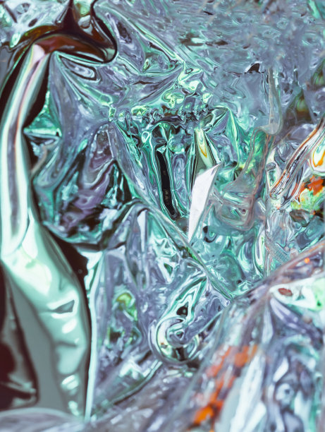 抽象背景，闪闪发光的褶皱全息图。时髦的霓虹纹理背景图片下载