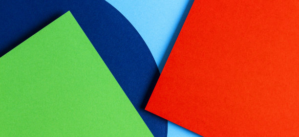 抽象彩色纸纹理背景。红色、浅蓝色、海军蓝、绿色的最小几何形状和线条图片下载