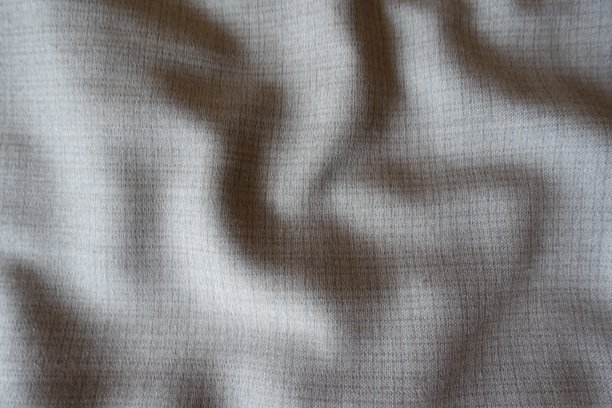 褶皱简单的灰色织物与双衬垫格子图片下载