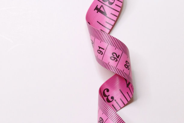 粉色卷尺测量英寸和厘米图片下载