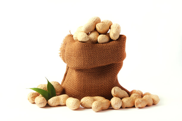 花生在一个明亮的背景特写图片下载