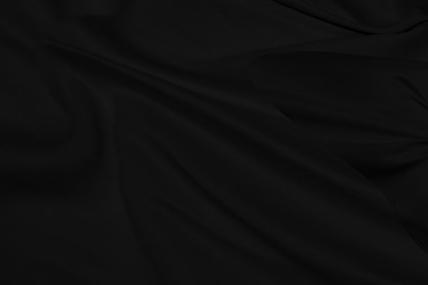 美丽的造型抽象的黑色恰煤织物柔软的织物光滑的曲线时尚矩阵装饰背景图片下载
