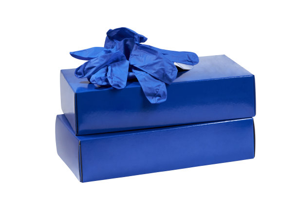 两盒蓝色丁腈一次性检查手套隔离在白色的切割路径上图片下载