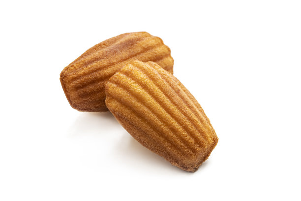 玛德琳蛋糕，贝壳形状的法国小海绵蛋糕孤立在白色图片下载