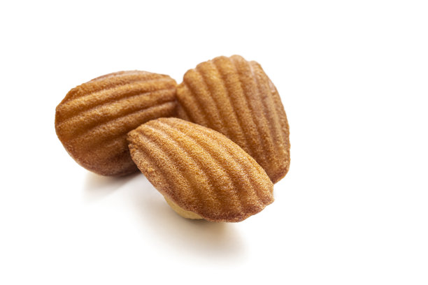 玛德琳蛋糕，贝壳形状的法国小海绵蛋糕孤立在白色图片下载