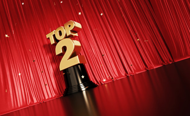 前3名概念-金色五彩纸屑落在一个金色的前2奖坐在红色舞台幕布图片下载