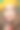 一个女人的肖像，用彩色的颜料刷在脸上。明亮的绿色眼睛。图片下载