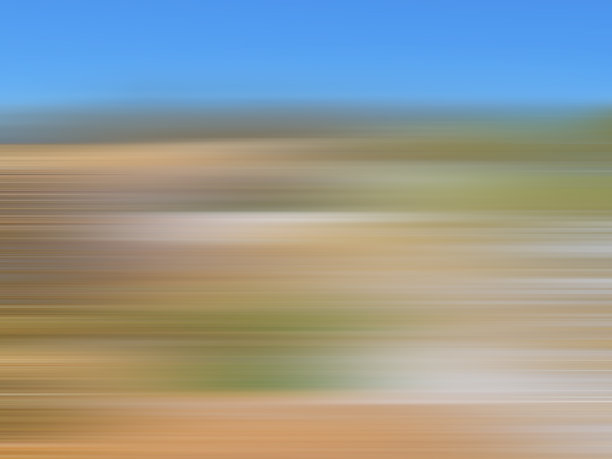 散焦景观与沙子，草地和天空。棕色，绿色，蓝色条纹。光滑的梯度。行速度。五彩缤纷的模糊的背景。抽象的设计。布纹面图片下载