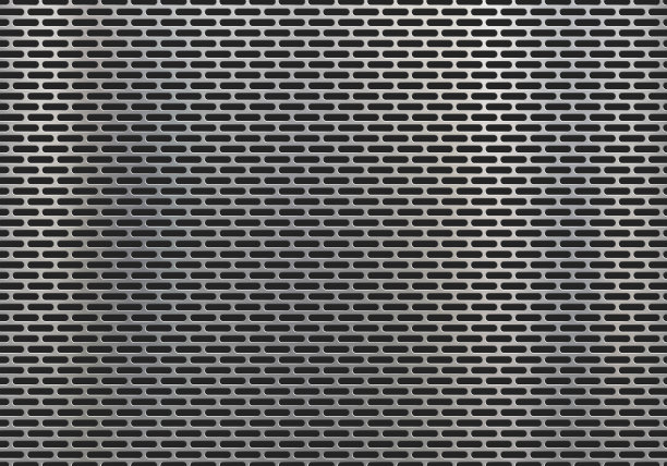 带有几何图案和孔洞的金属板。图片下载