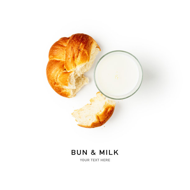 一杯牛奶和新鲜面包的创意布局图片下载