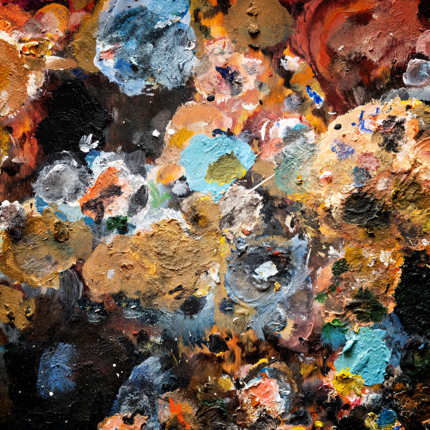 调色板与混合颜色的油画颜料。图片下载