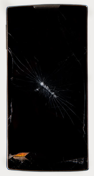 白色背景下屏幕损坏的智能手机图片下载