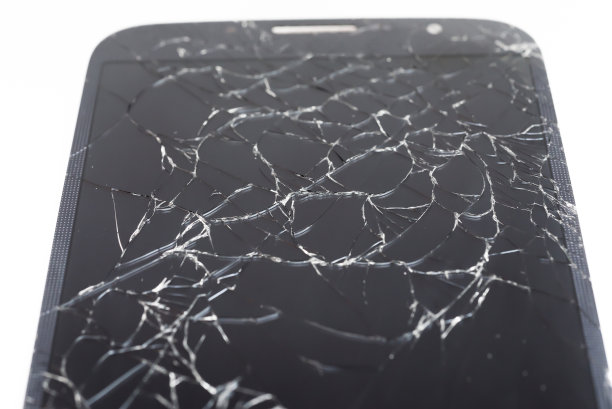 手机智能手机破碎玻璃液晶触摸屏上的白色背景。图片下载