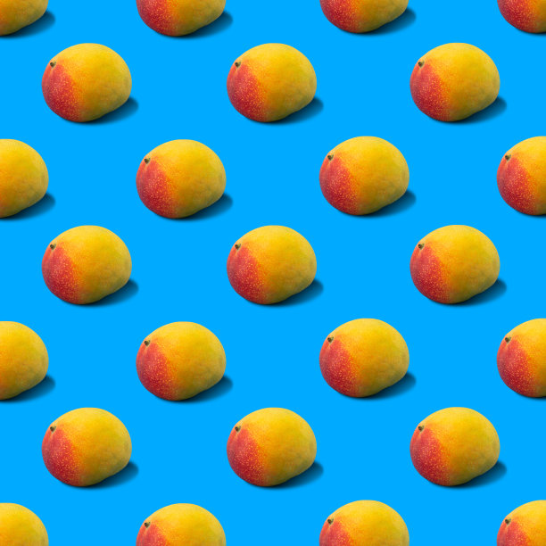 摘要芒果果实图案上的蓝色背景图片下载