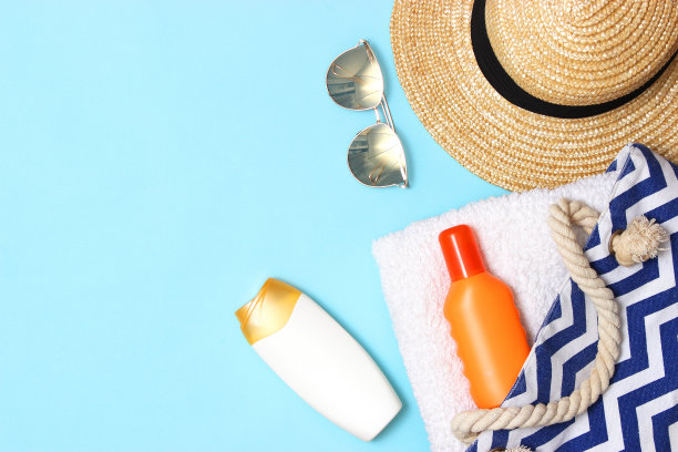 彩色背景特写上的防晒霜。皮肤防晒图片下载