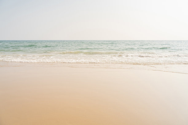 空旷的海洋和热带海滩背景。图片下载