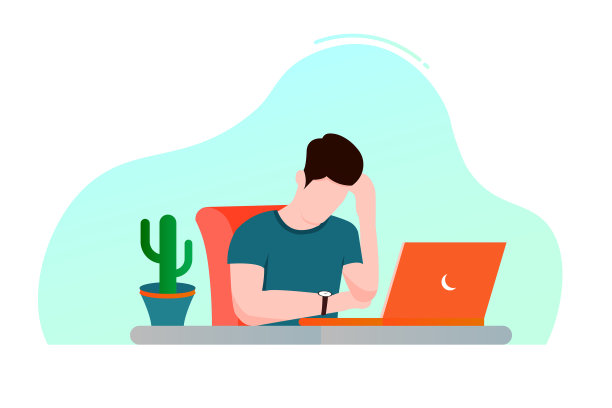 一个男人在家里用笔记本电脑工作图片下载