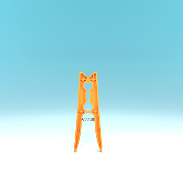 彩色背景上的塑料衣夹图片下载