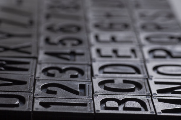 Letterpress字母表和数字背景图片下载