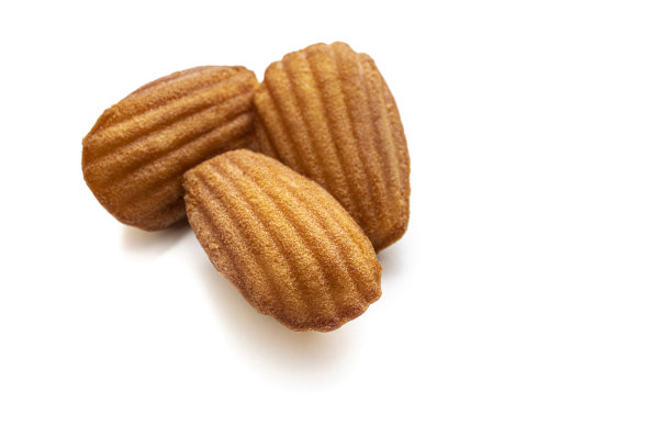 玛德琳蛋糕，贝壳形状的法国小海绵蛋糕孤立在白色图片下载