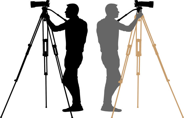 相机操作员在一个三脚架摄影师图片下载