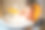 可爱的婴儿在桌子上玩一个塑料盘子。小孩吃完饭就喜欢坐在婴儿椅上图片下载