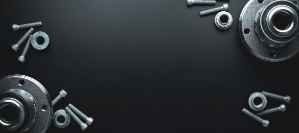 发动机齿轮。汽车机械备件或汽车件上的黑色旗帜背景。一套新的金属汽车零件。平铺，俯视图，拷贝空间。图片下载