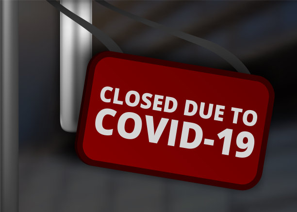 商业中心或商店前的大红色关门标志图片下载