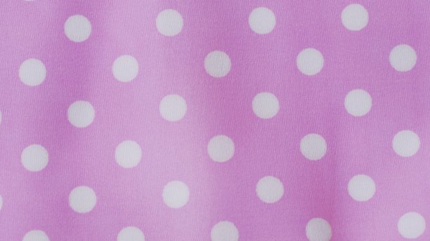 粉红色背景上的白色圆点图案图片下载