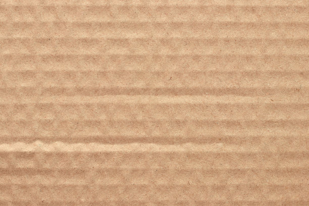 棕色硬纸板抽象背景，纹理回收纸盒在旧的复古模式设计艺术作品。图片下载