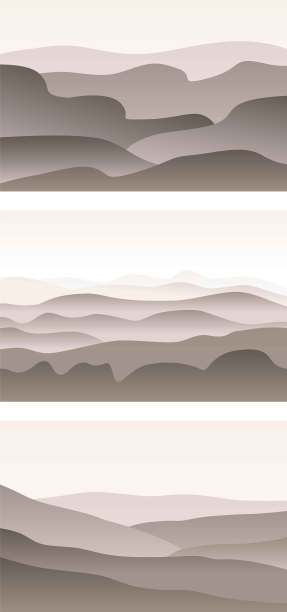 带有波浪的单色景观。日落的天空。温暖的灰色和米色的雾山剪影。沙漠沙丘。自然与生态。水平方向。对于社交媒体，明信片和海报图片下载