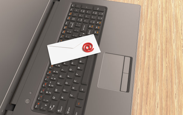 电子邮件概念与“在”符号，信封和笔记本电脑图片下载