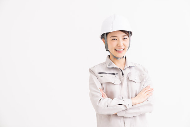 女建筑工人和白色安全帽图片下载