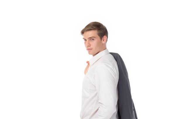 一个自信的年轻商人的肖像孤立在白色的背景。肖像经营理念。图片下载